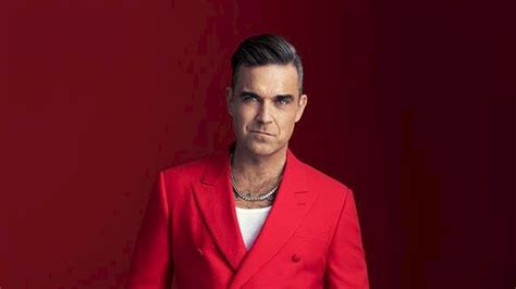 Robbie Williams: Live Aid 2023 Comeback Performance & The Return of Pop Royalty